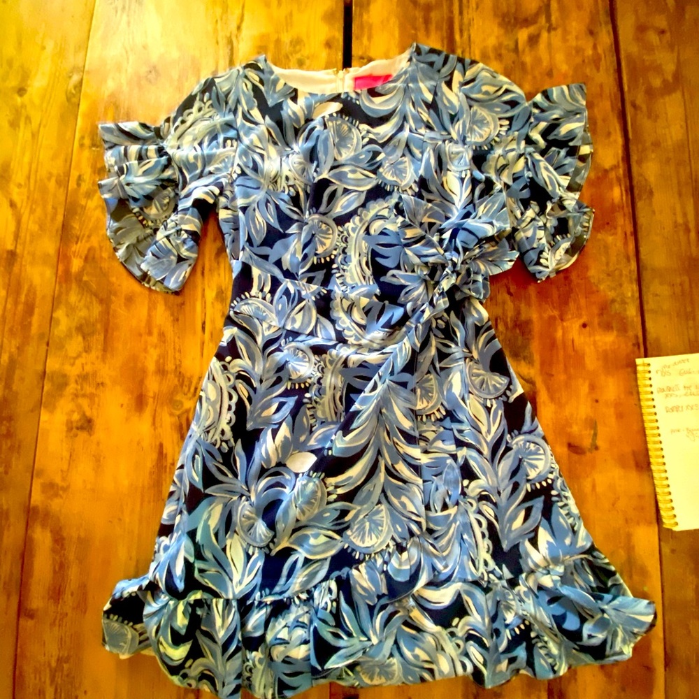 Worn once blue wrap around Lilly dress